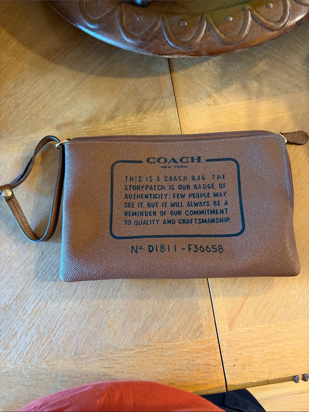 Coach Brown Leather Wristlet with Black Logo Print